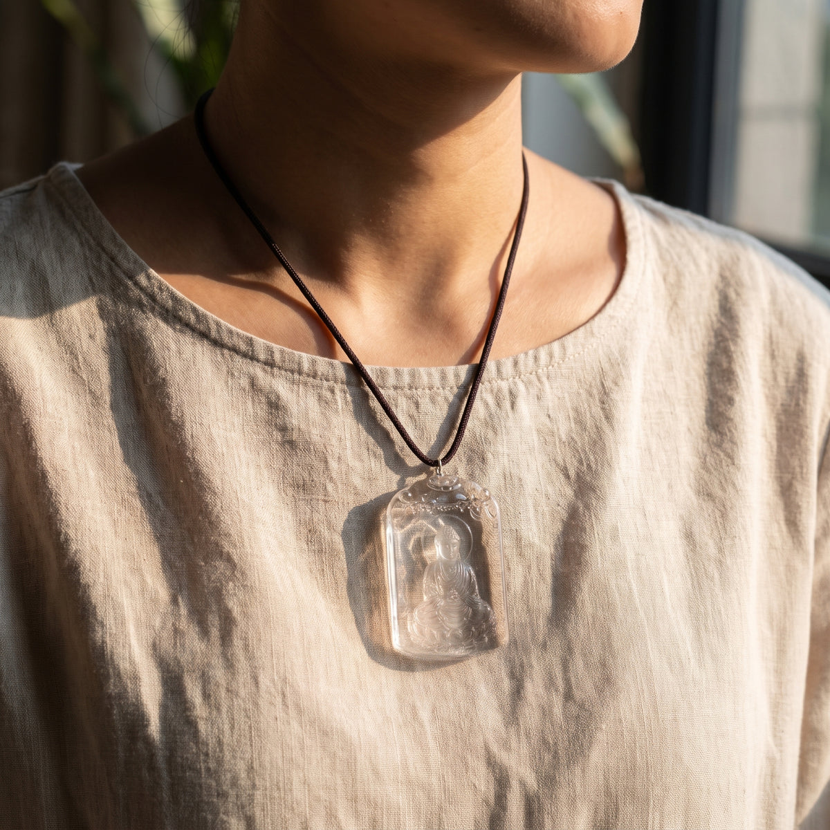 Clear Quartz Buddha Pendant – Protection & Calm — display at home